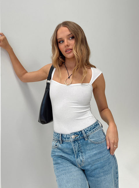 front view of model wearing Princess Polly Halia Bodysuit White Sleeveless Sweetheart 