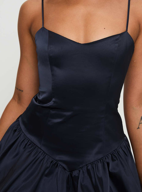 back view of model wearing Princess Polly Dollhouse Mini Dress Navy V-Neck 