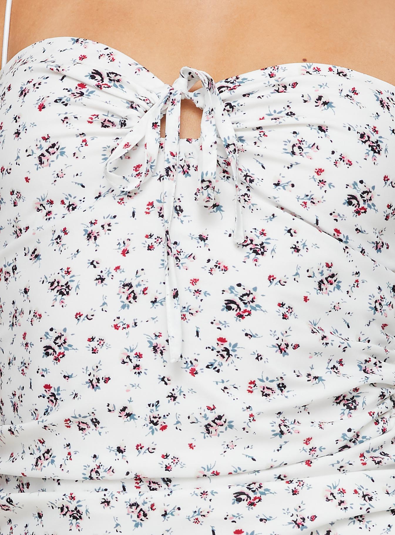 Floral mini dress Elasticated shoulder straps, sweetheart neckline, tie fastening at bust, invisible zip fastening at side, adjustable ruching at side