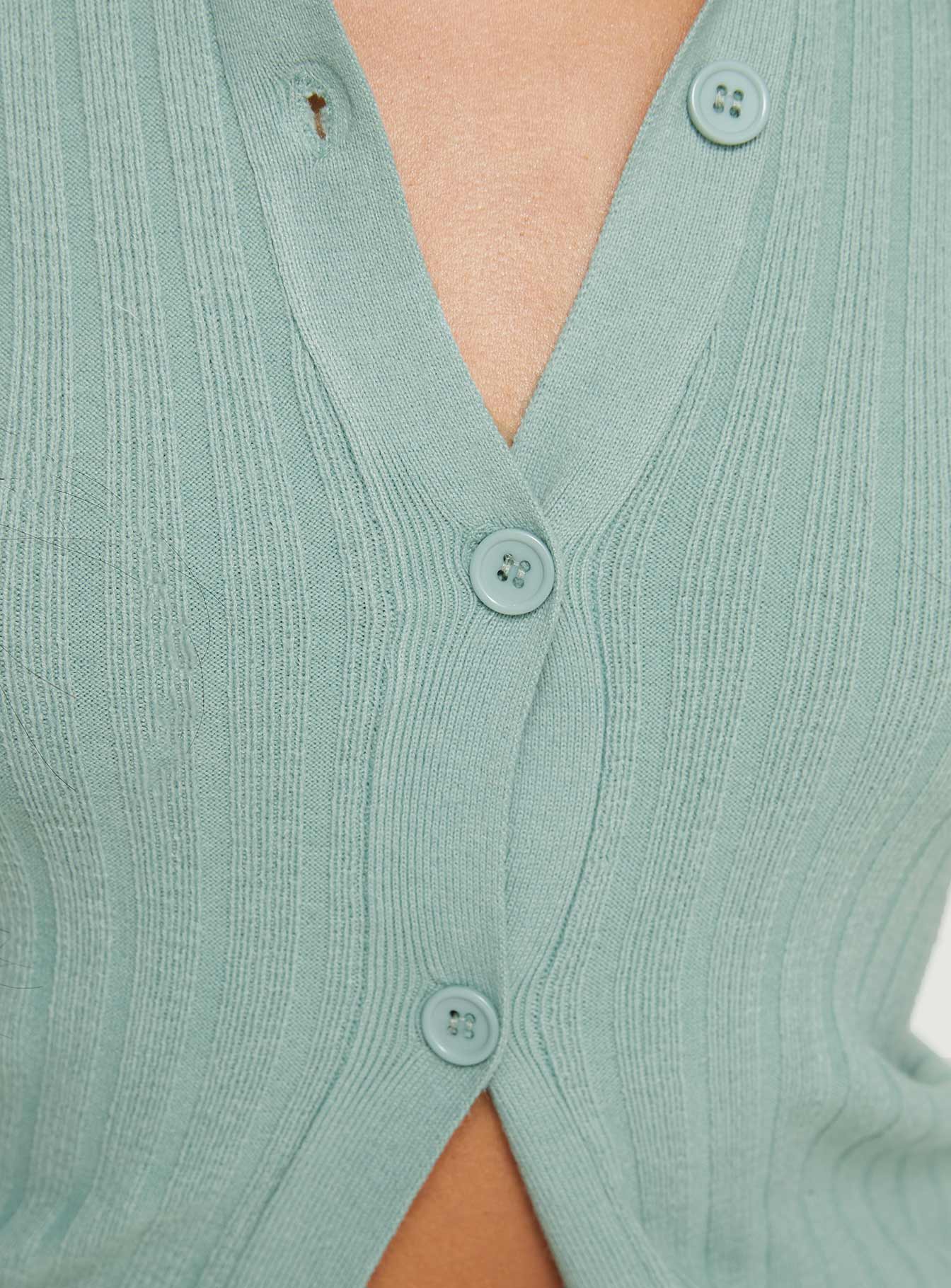Collared knit cardigan Classic collar, button fastening at front, flared cuff Good stretch, unlined