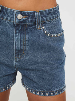Denim shorts High rise fit, silver studded detailed, classic five pocket design, belt loops at waist, zip and button fastening, branded patch at back