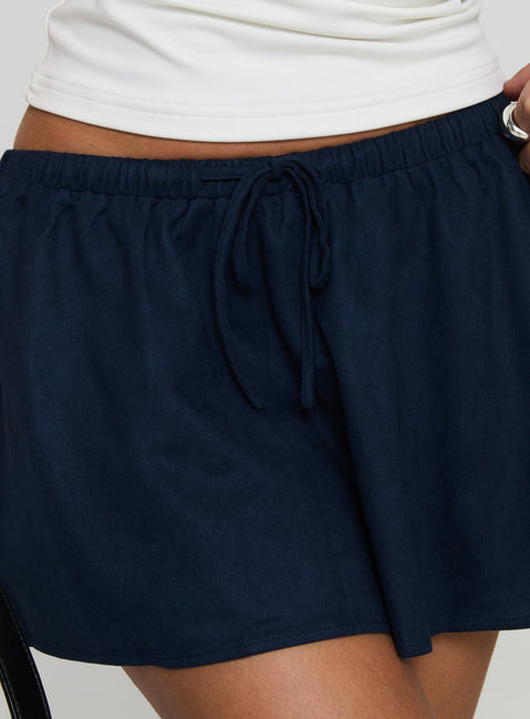 back view of model wearing Princess Polly Ghost Mini Skirt Mineral Mini Skirts 