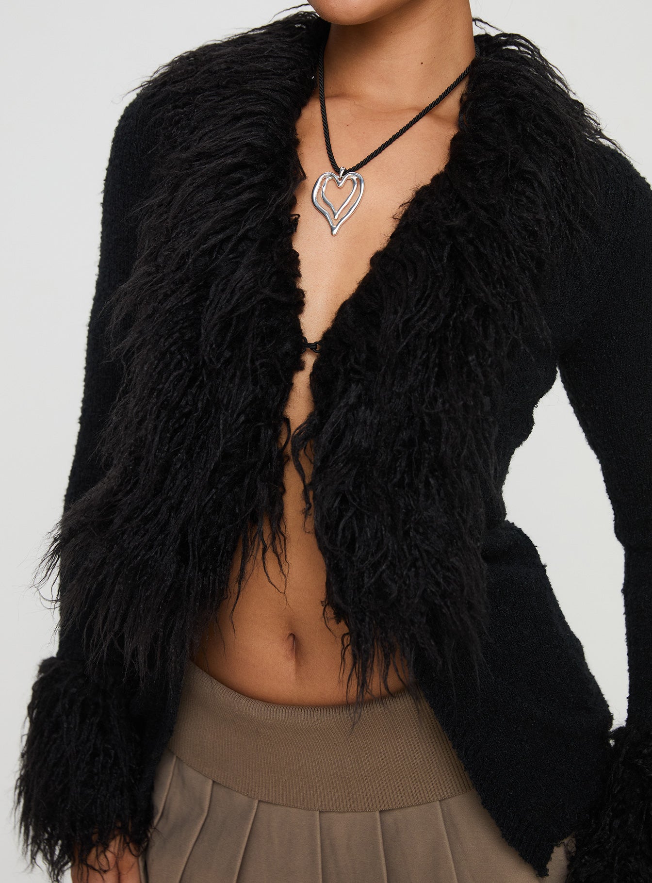 back view of model wearing Princess Polly Sistine Cardigan Black Longline Jumpers 