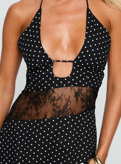 back view of model wearing Princess Polly Down With Love Asymmetrical Midi Dress Black / White Polka Plunger 