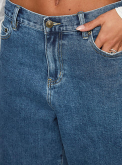 back view of model wearing Princess Polly Retro Dream Mid Rise Longline Denim Shorts Mid Wash Low Rise Shorts 