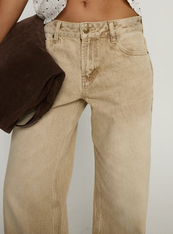 back view of model wearing Princess Polly Serenitia Mid Rise Relaxed Jeans Sandy Brown Wash Mid Rise Jeans 
