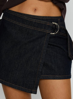   side view of model wearing Princess Polly Elinora Wrap Mini Skirt Raw Denim Mini Skirts 