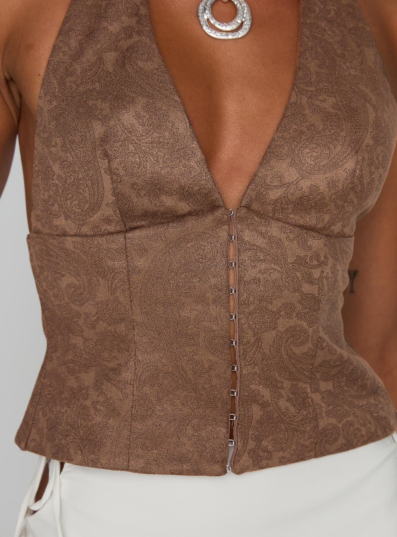 back view of model wearing Princess Polly Down The Line Halter Top Brown Sleeveless Plunger 
