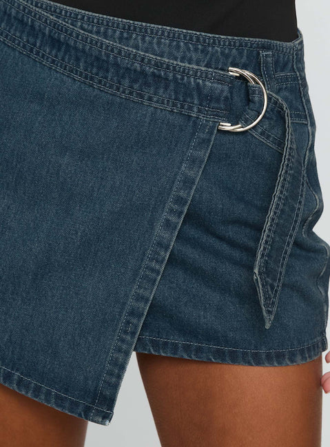 back view of model wearing Princess Polly Elinora Wrap Mini Skirt Mid Blue Wash Mini Skirts Skirts 