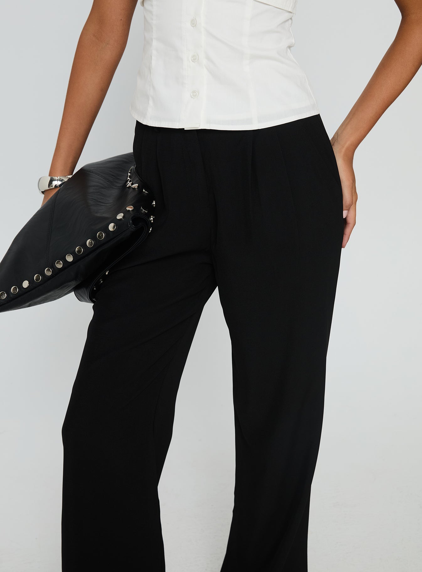 side view of model wearing Princess Polly Ambient Wide Leg Pant Black High Waisted Pants 