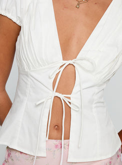 back view of model wearing Princess Polly Incomparable Pleated Bust Top White Short Sleeves Plunger 