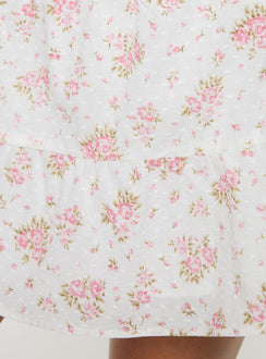 Floral print mini skirt Mid rise, tiered design, invisible zip fastening at side