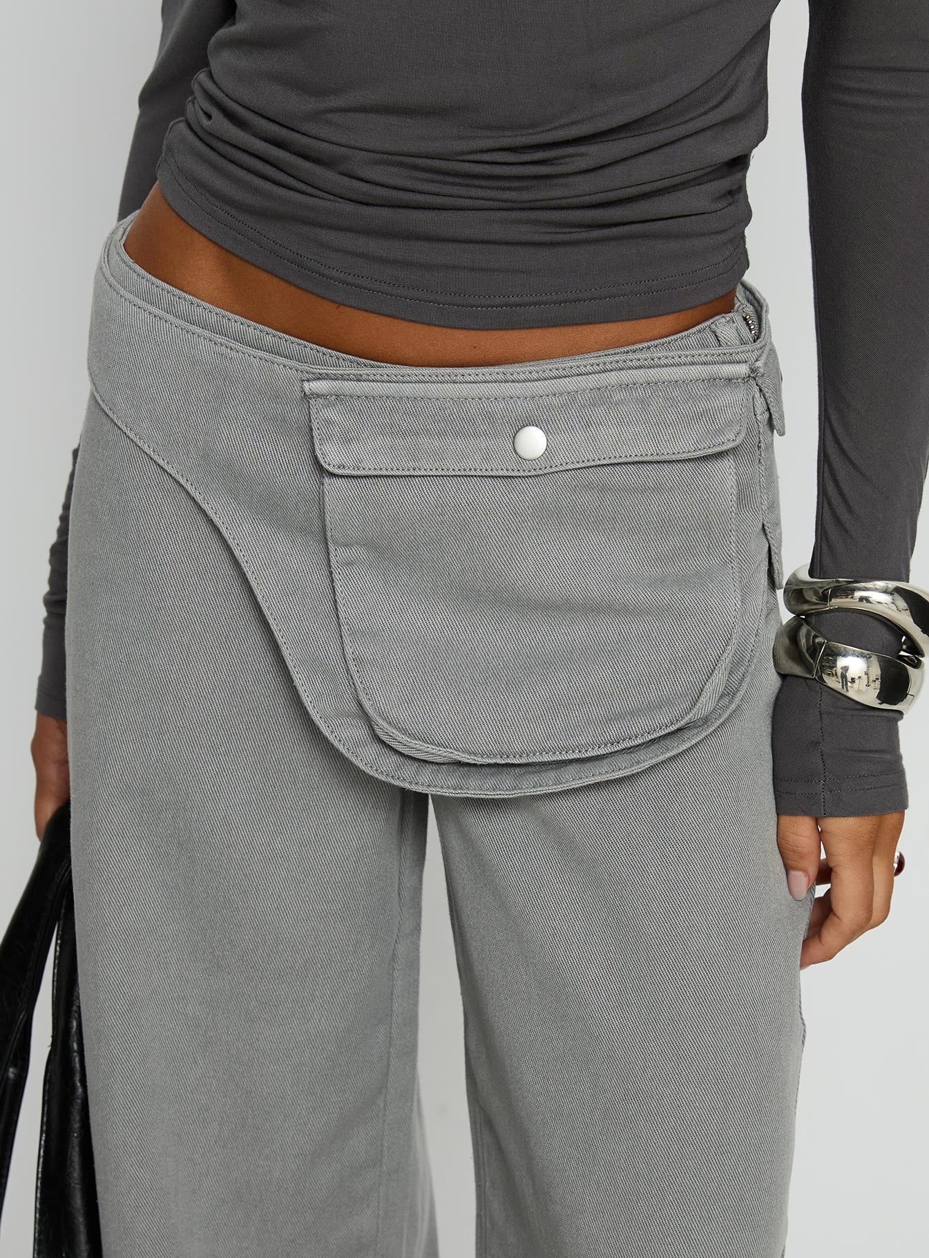 front view of model wearing Princess Polly Incognito Low Rise Wide Leg Cargo Jeans Grey Low Rise Jeans 