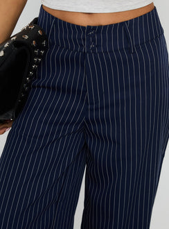 back view of model wearing Princess Polly Lorenne Mid Rise Pant Navy Pinstripe High Waisted Pants 