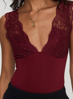 back view of model wearing Princess Polly Roan Lace Bodysuit Burgundy Sleeveless Plunger 