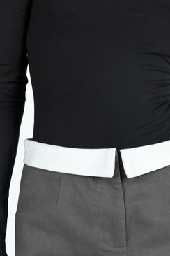 Long sleeve bodysuit Ribbed material Off the shoulder design Thumb holes at cuff G string style bottom Press clip fastening Good stretch Lined bust