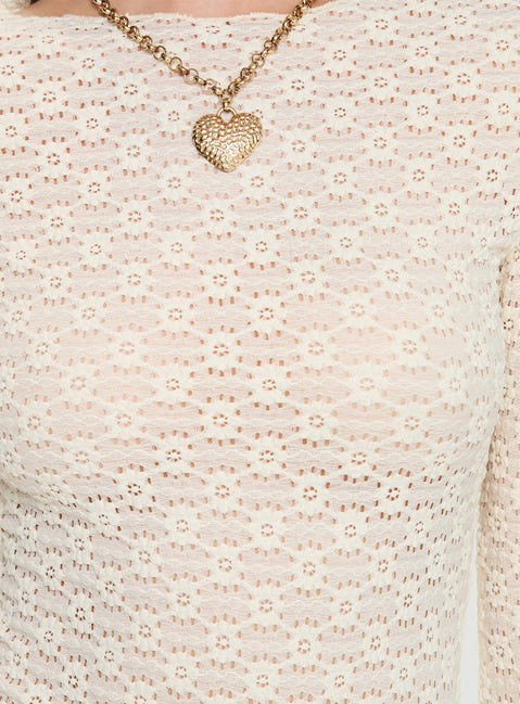Long sleeve mini dress Knit material, high neckline, flared sleeves Good stretch, unlined, sheer