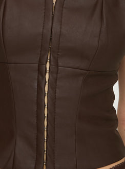 Faux leather top Corset style, fixed straps, lace trim detail, hook & eye fastening Non-stretch material, lined bust