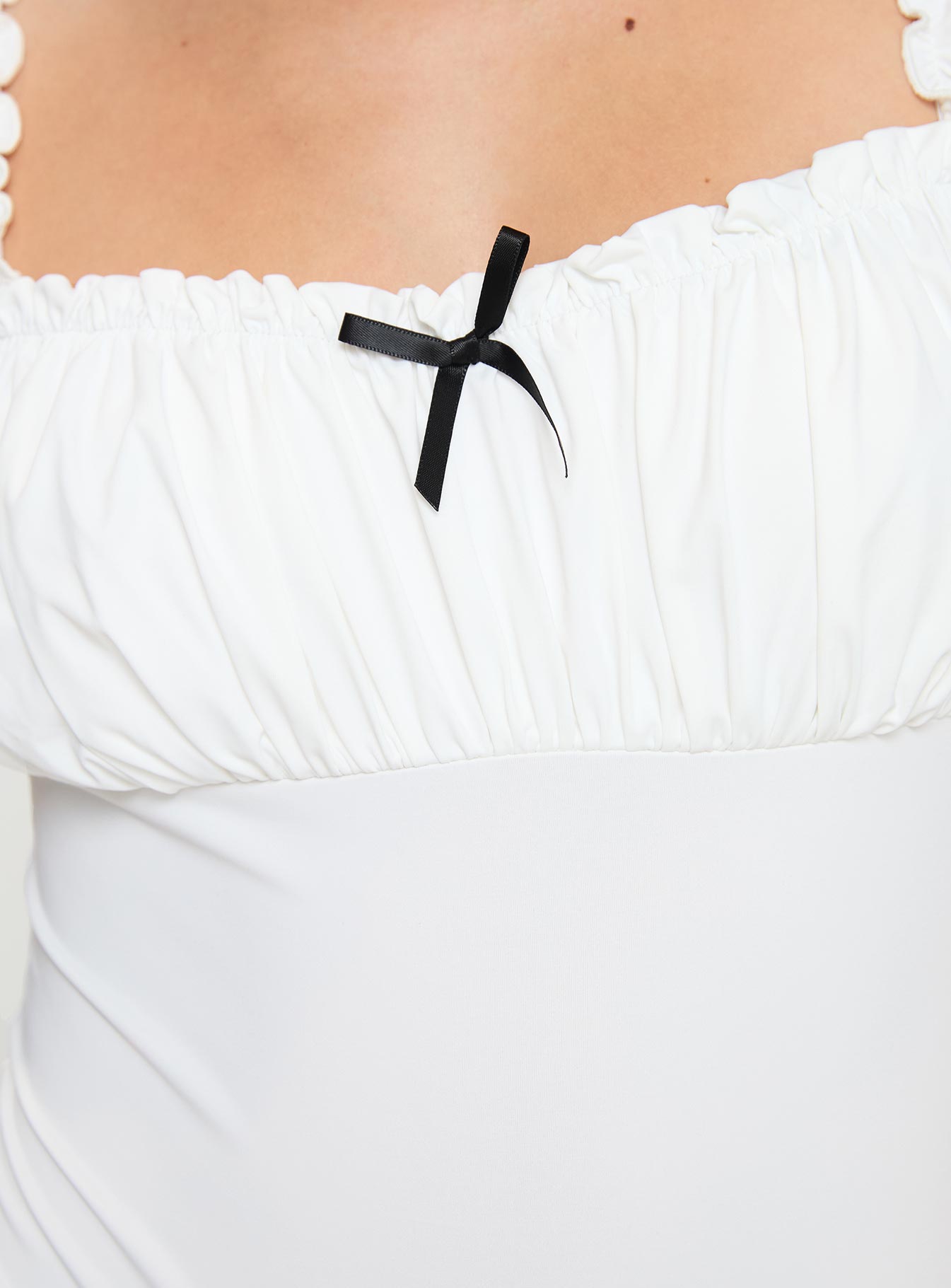 Bodysuit Elasticated shoulder straps, square neckline, ruched bust, high cut leg, press clip fastening, cheeky style bottom Good stretch, lined bust Princess Polly Lower Impact