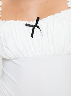 Bodysuit Elasticated shoulder straps, square neckline, ruched bust, high cut leg, press clip fastening, cheeky style bottom Good stretch, lined bust Princess Polly Lower Impact