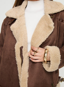 Shearling jacket Classic collar, exposed zip fastening, twin pockets with zip closure, buckle detail Non-stretch material, shearling lining