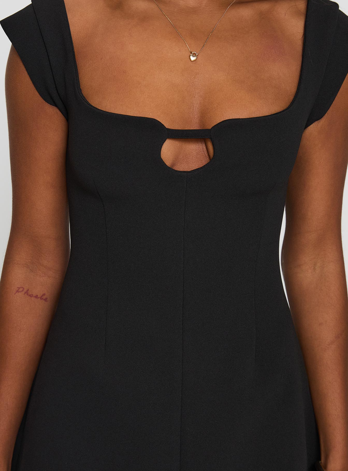 back view of model wearing Princess Polly Sylvette Mini Dress Black Sweetheart Neckline 