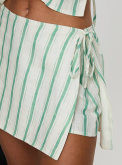 back view of model wearing Princess Polly Gulliver Tie Side Mini Skort Green Stripe High Waisted Shorts 