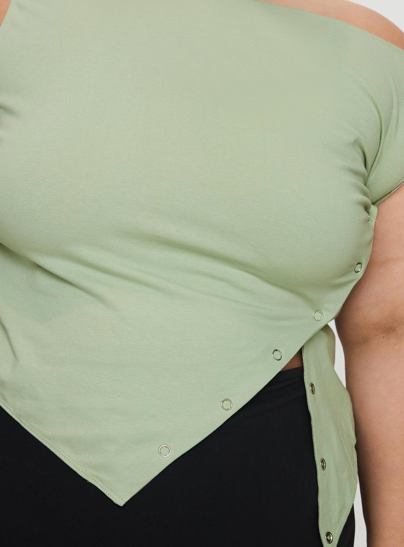 back view of model wearing Princess Polly Karre Off The Shoulder Top Sage Curve Short Sleeves Asymmetric Neckline 