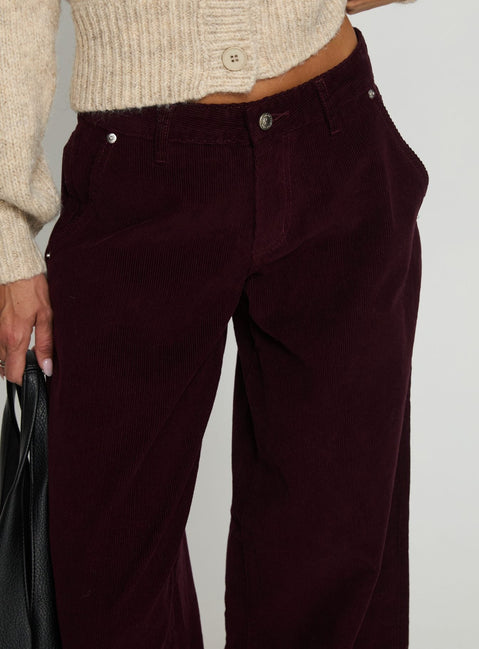back view of model wearing Princess Polly Jacynda Low Waist Wide Leg Corduroy Jeans Currant Mid Rise Jeans 