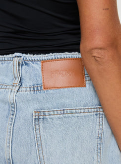 Denim mini skirt High rise fit, belt looped waist, zip and button fastening, raw edge hem Non stretch material, unlined