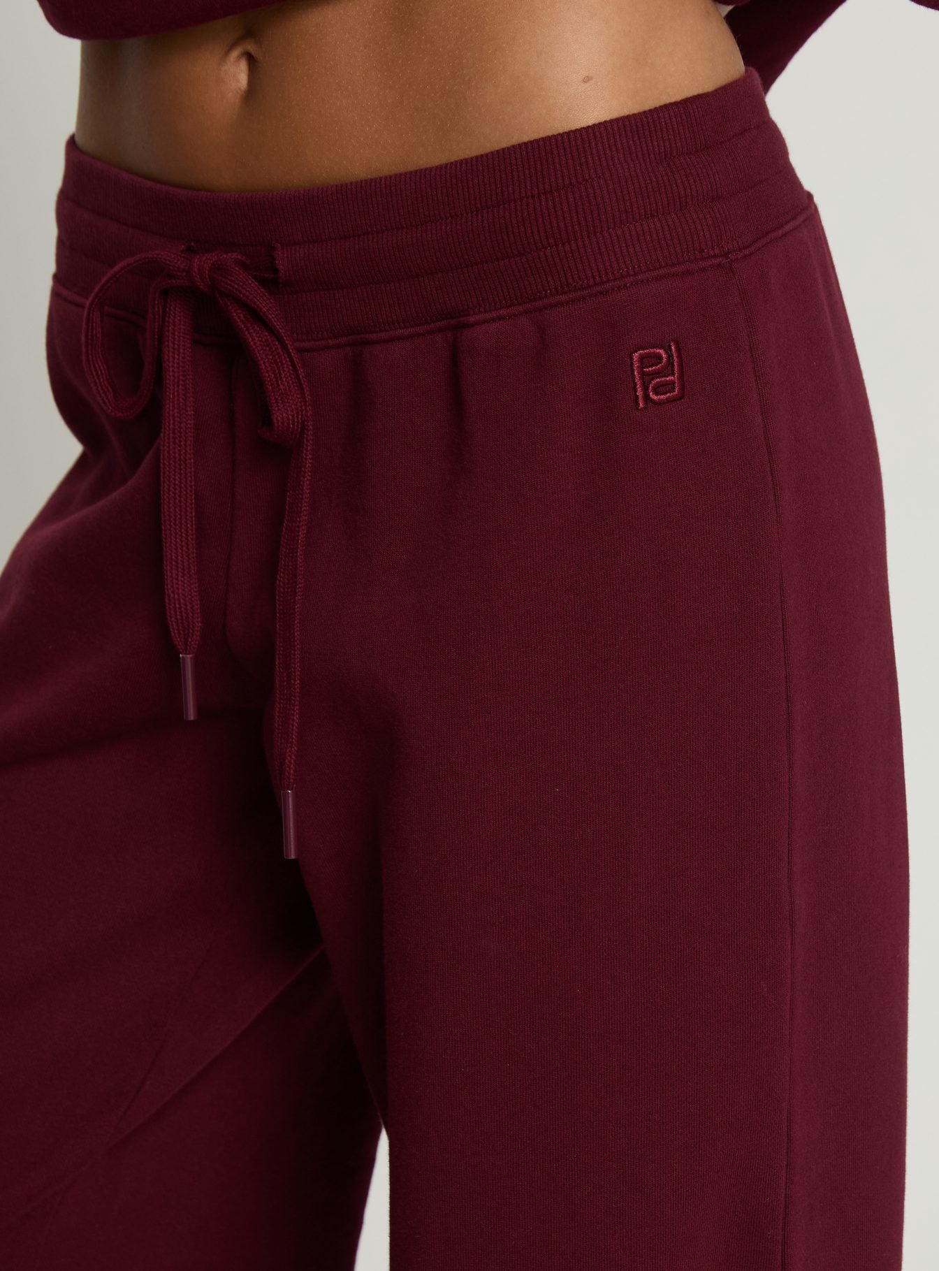 side view of model wearing Princess Polly Dodie Wide Leg Pants Washed Currant Mid Rise Pants 