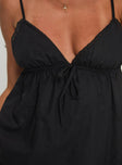 Black mini dress V neckline, adjustable straps, lace trim detail