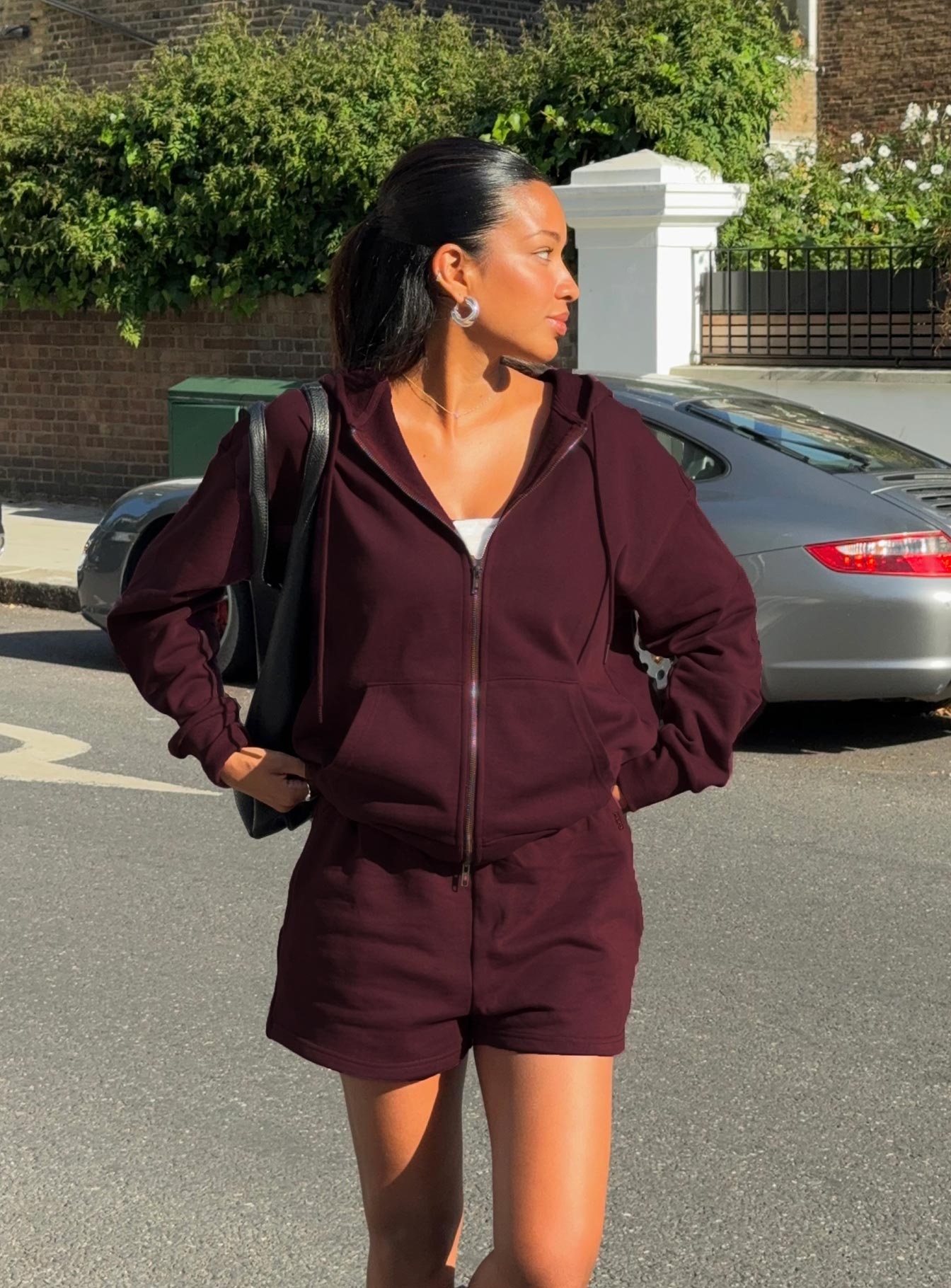 front view of model wearing Princess Polly All Day Short Wine High Waisted Shorts 