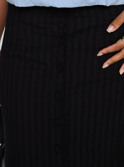 back view of model wearing Princess Polly Livie Maxi Skirt Black Maxi Skirts Skirts 