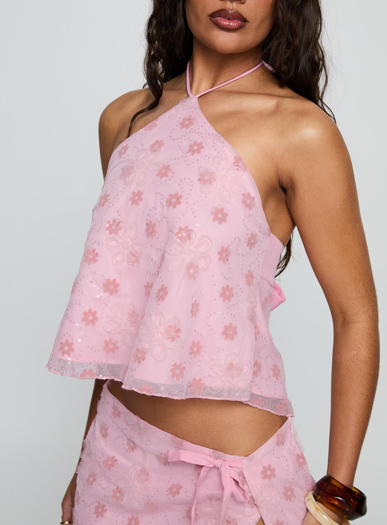 front view of model wearing Princess Polly Remembering Tie Back Top Pink Sleeveless Asymmetric Neckline 