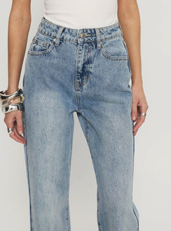 front view of model wearing Princess Polly Florida Keys Mid Rise Straight Leg Cuffed Jeans Light Blue Wash High Waisted Jeans 