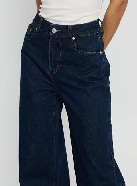 back view of model wearing Princess Polly Goldie High Rise Wide Leg Jeans Indigo High Rise Jeans 