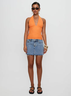 front view of model wearing Princess Polly Emaline Halter Top Orange Sleeveless Plunger 
