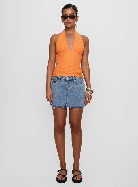 front view of model wearing Princess Polly Emaline Halter Top Orange Sleeveless Plunger 