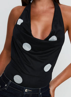 back view of model wearing Princess Polly Cleona Plunge Neck Bodysuit Black Polka Sleeveless 