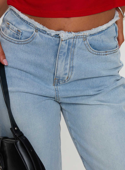 back view of model wearing Princess Polly Hawke Frayed Jeans Mid Blue High Waisted 