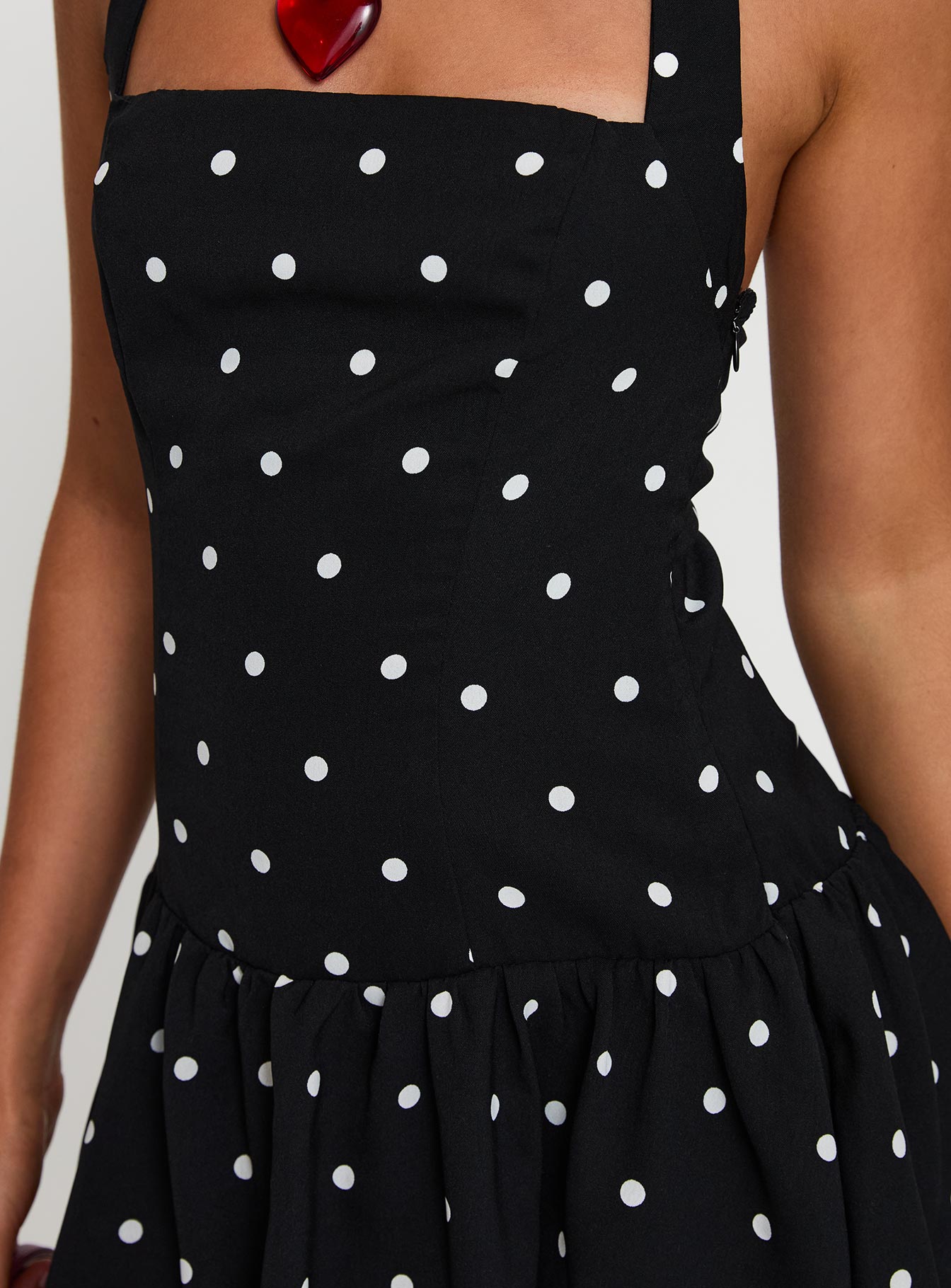 back view of model wearing Princess Polly Gigli Bubble Hem Mini Dress Polka Dot Square Neck 