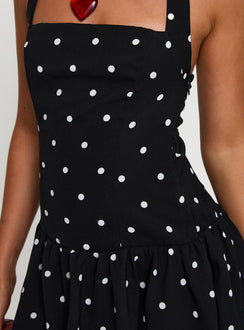 back view of model wearing Princess Polly Gigli Bubble Hem Mini Dress Polka Dot Square Neck 