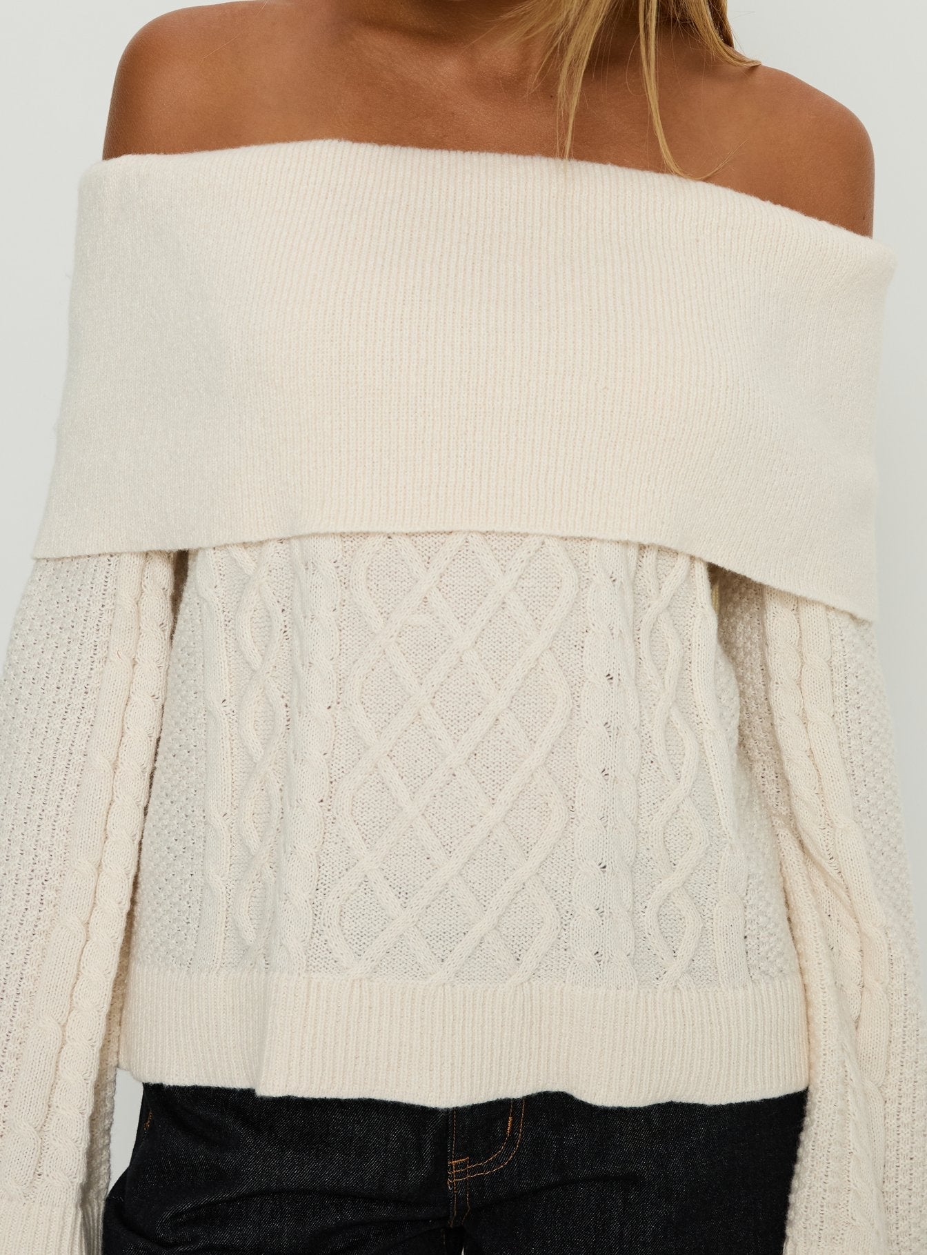 Presenting the Margarete Off Shoulder Knit Sweater Cream womens jumper with short length and boat neckline front view of model wearing Princess Polly