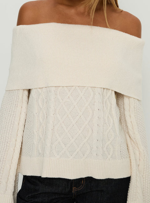 Presenting the Margarete Off Shoulder Knit Sweater Cream womens jumper with short length and boat neckline front view of model wearing Princess Polly