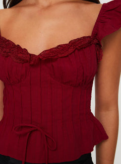 front view of model wearing Princess Polly Mylan Top Burgundy Short Sleeves Sweetheart 