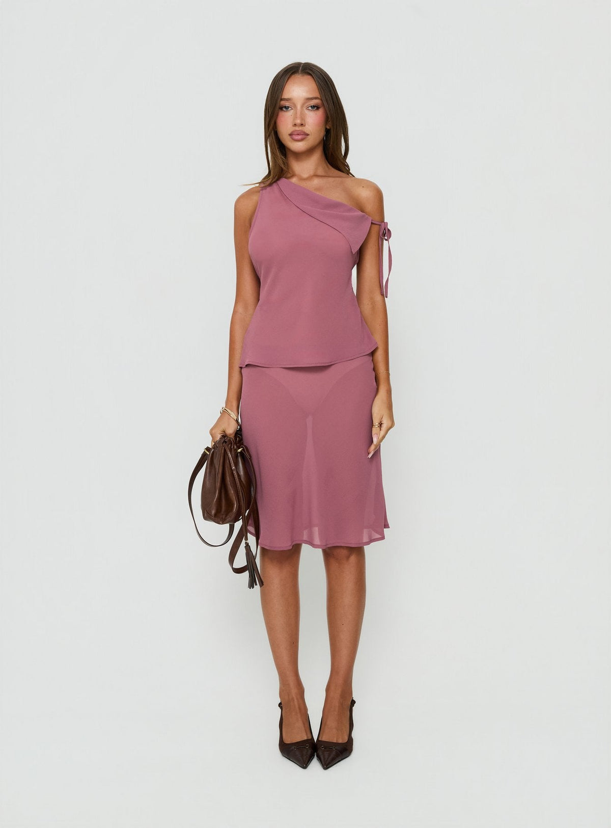 Showcasing the Vianna Sheer Midi Skirt Pink in womens-skirts with midi length front view of model wearing Princess Polly