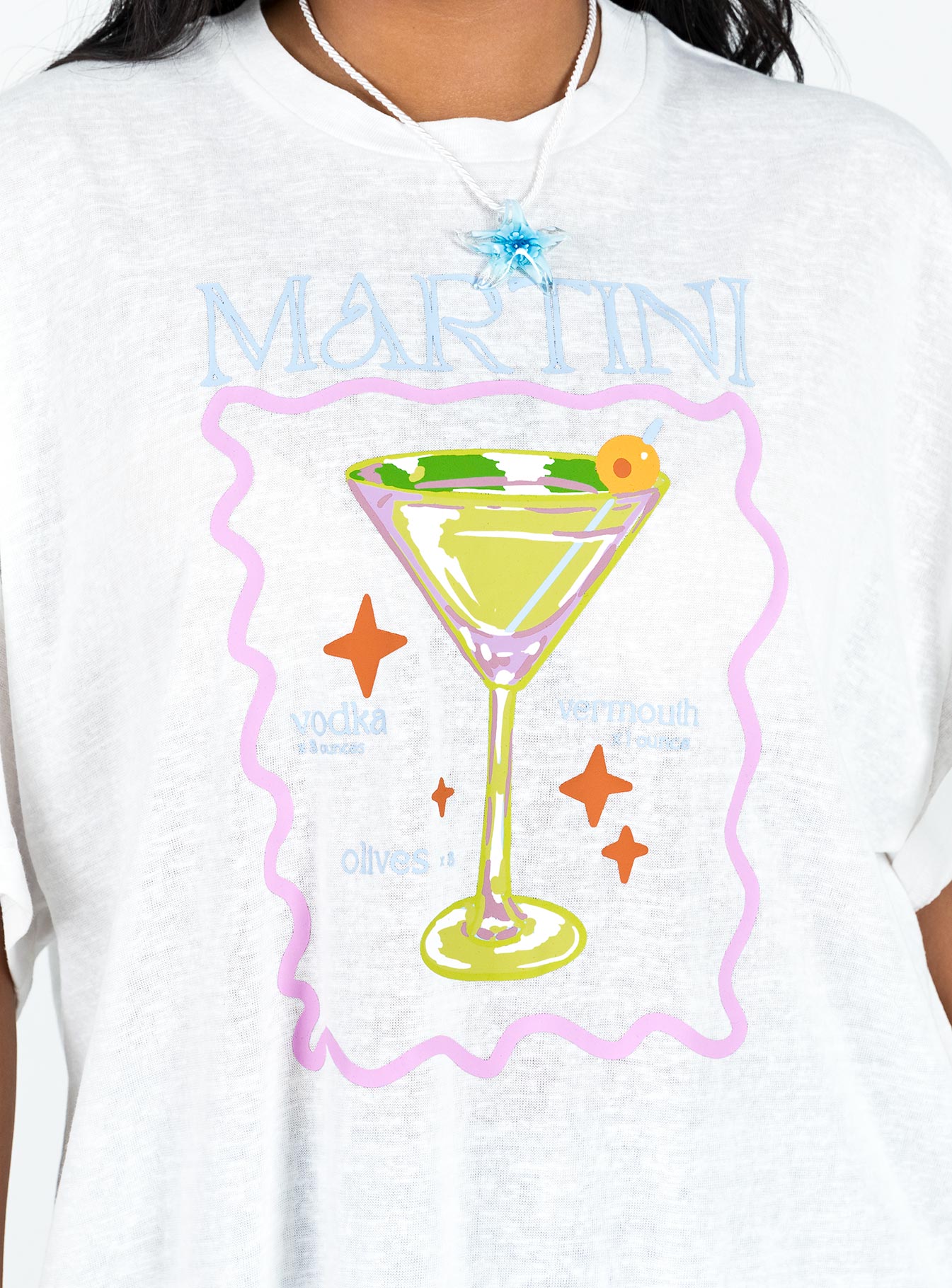 Front view of model wearing  front Princess Polly Full Sleeves High Neck  Martini Oversized Tee White