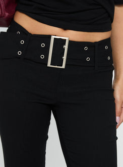 back view of model wearing Princess Polly Kortnee Eyelet Detail Flare Leg Pants Black Low Rise Pants 