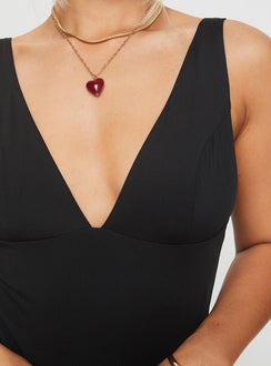 back view of model wearing Princess Polly Enid Bodysuit Black Sleeveless Plunger 